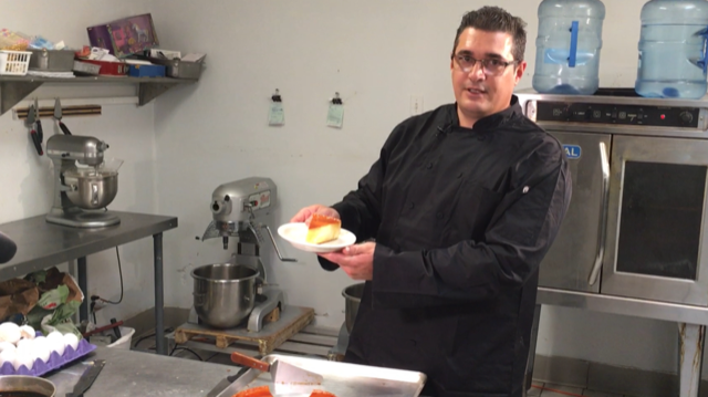 Owner Manuel Cias-Hernandez shows off his famous flan at the restaurant!