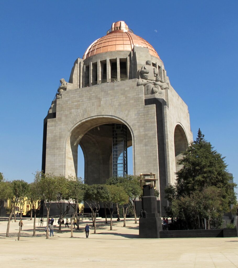 Evocative image of the western face of the Monument to the Revolution in Mexico City, symbolizing the city's rich history and the nation's revolutionary spirit.